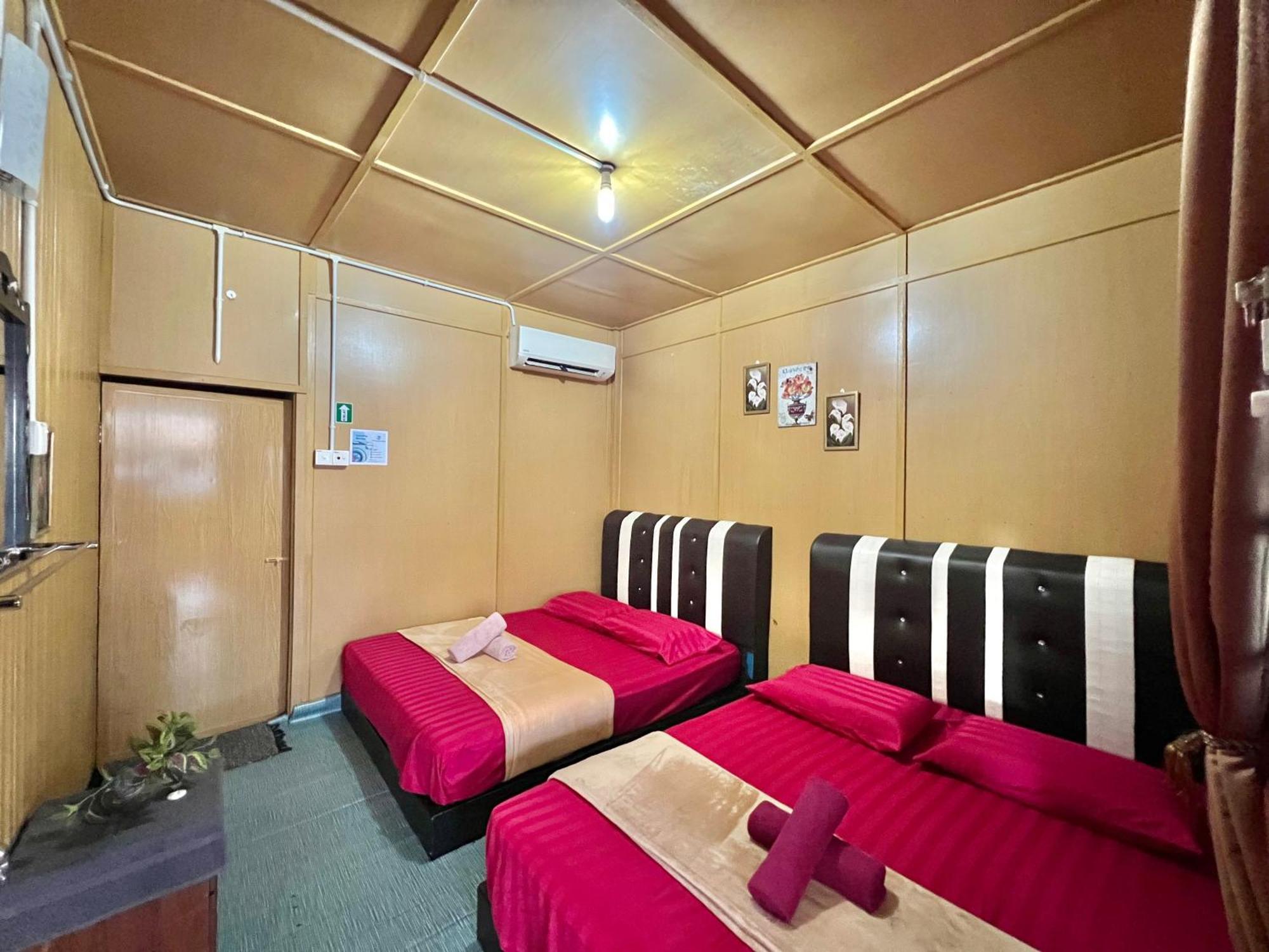 Guest house Perhentian Sri Tanjung , Kampung Nelayan Pulau Perhentian *