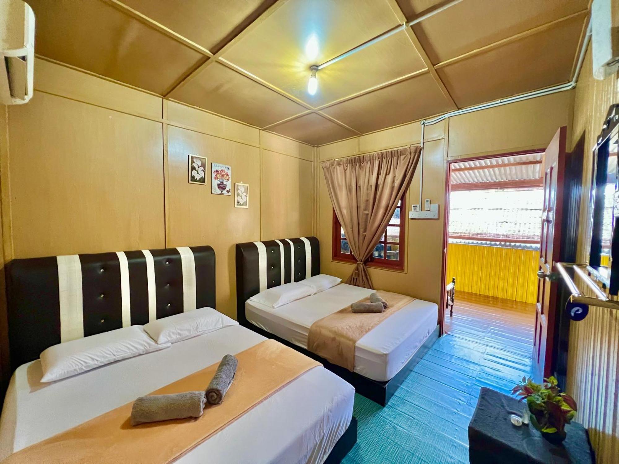 Perhentian Sri Tanjung , Kampung Nelayan Pulau Perhentian Guest house Pulau Perhentian Kecil